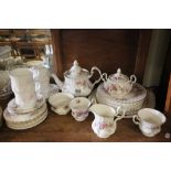 A collection of Royal Albert Lavender Rose dinner wear to include teapot, sugar bowl, milk jug etc
