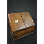 An early 20th century mahogany desk top stationary cabinet