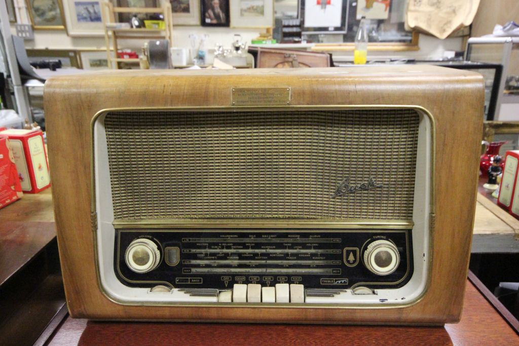 A vintage walnut cased radio by Bush