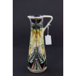 A 2004 Moorcroft jug, part of the New Zealand collection decorated in Kowkhai flower, boxed