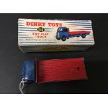 Boxed Dinky 512 Guy Flat Truck in blue cab and red flat bed, blue hubs, play worn