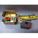 Three boxed Triang Scalextric accessories to include Racing figures (6 figures plus one broken),