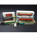 Four boxed VEB Eisenbahn HO scale engines to include V180, BR75, BR75 & EM19 (tatty boxes)