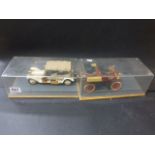 Two cased Franklin Mint diecast model vehicles in vg condition