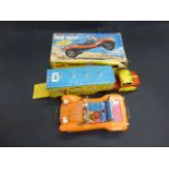 Boxed Mego Battery Operated Wild Wheeling Dune Buggy and a tin plate Marx King of the Cowboys