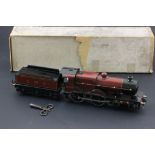 Boxed Bassett Lowke O gauge clockwork 1190 LMS locomotive with tender, in maroon livery, with key