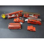 Five Dinky diecast fire vehicles to include 555 Fire Engine, Fire Engine, 255 Mersey Tunnel, 109