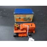 Boxed Dinky 563 Heavy Tractor in orange with some paint loss, driver in tact, no treds