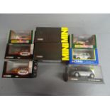 Eight boxed Corgi diecast Mini vehicles 1:36 scale to include; 04506, 04437, 04404, CC82202,