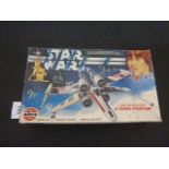 Boxed Airfix Star Wars Luke Skywalker X-Wing Fighter plastic model kit, un-made and appearing