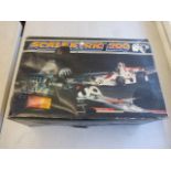 Boxed Scalextric 200 C559 complete with power unit and an additional slot car