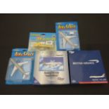 Five boxed diecast aircraft vehicles to include; Gemini sets GJBAW016, GJBAW630, Ertl Wessex