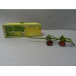 Boxed Britains Farm No 129F Timber Trailer in fair condition, play worn and paint loss, box lid