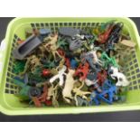 A collection of plastic figures including military, circus animals and others