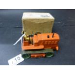 Boxed Dinky Supertoys 563 Heavy Tractor in orange, driver in tact, green hubs, treds, paint loss but