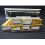 Seven boxed Schicht HO scale coaches plus one in polystyrene to include CSD x 4 and DR x 4 (8)