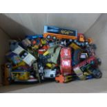 A large collection diecast models, all playworn and unboxed, including Dinky, Corgi,