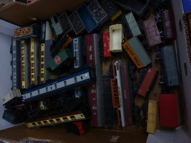 A collection of 46 "00" items of rolling stock to include wagons, truck, coaches, featuring