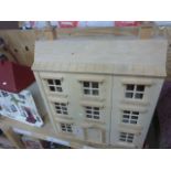 A wooden doll's house