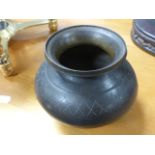 A small antique bronze vase