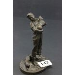 Bronzed resin figure of a boy with pigs & piglets