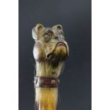 A 20th century umbrella the handle carved in to a dog's head, set with glass eyes