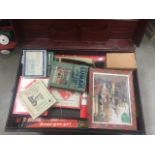 A collection of vintage games, in a tin trunk