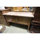 An Edwardian marble topped mahogany washstand