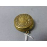 Small French brass compact with mirror inside lid