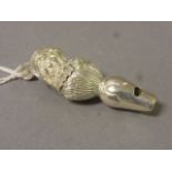 Silver whistle in the form of a lady with a bonnet