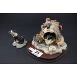 A Border Fine Arts model "Let Sleeping Dogs Lie", along with one other Border Fine Arts figure