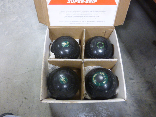 Set of four Henselite lawn bowls in original box