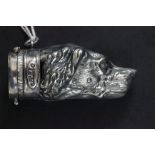 A silver plated vesta case in the form of a dog