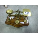 A set of brass letter scales