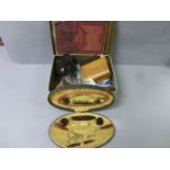 Tin of mixed collectables to include; scissors and a cased vanity set