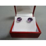 Pair of silver and amethyst earrings