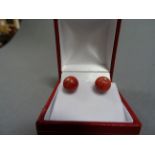 Pair of silver & apple coral earrings