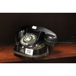 A vintage black Edison Bell telephone