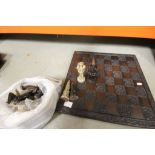 A chess board with mystical chess pieces