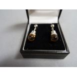 Pair of white gold diamond and citrine drop earrings