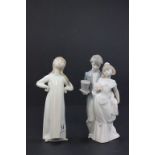 A Lladro figure of a wedding couple, along with one of a standing girl