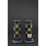 A pair of Royal Doulton stoneware vases