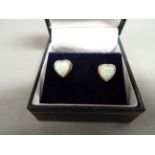 Pair of silver and heart shaped opal earrings