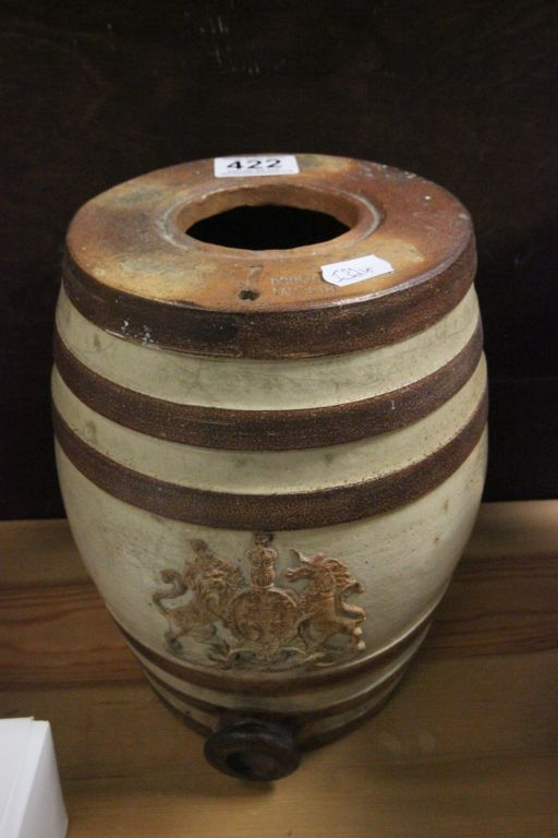 A 19th century stoneware spirit jar, with applied coat of arms