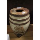 A 19th century stoneware spirit jar, with applied coat of arms