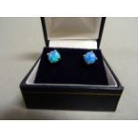 Pair of silver and blue opal stud earrings