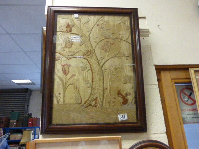 An early 19th Century silk needle work of animals and birds in a naturalistic setting