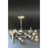 A collection of miscellaneous silver ware including spill vases etc