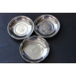 Three Chinese silver coin dishes