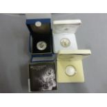 Four cased silver proof coins to include; gold plated £5 Queens 60th Anniversary, Diamond Jubilee £